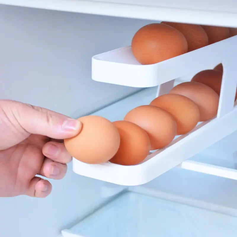 Soporte para huevos con desplazamiento automático